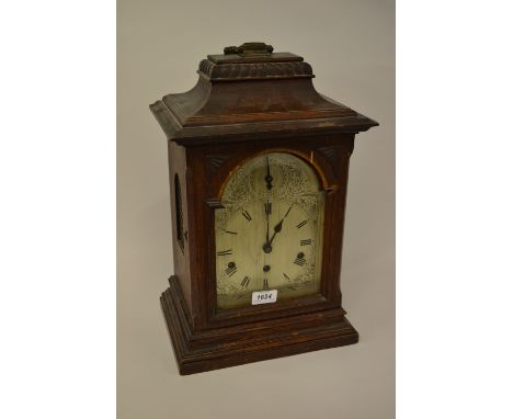 Late 19th or early 20th Century German oak cased bracket clock, the silvered dial with Roman numerals and chime silent select