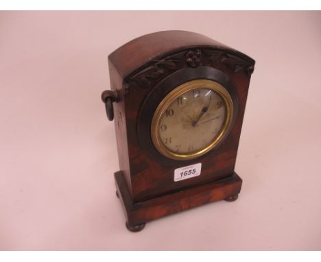 Small Victorian mahogany mantel clock, the silvered dial with Arabic numerals with a French cylinder movement