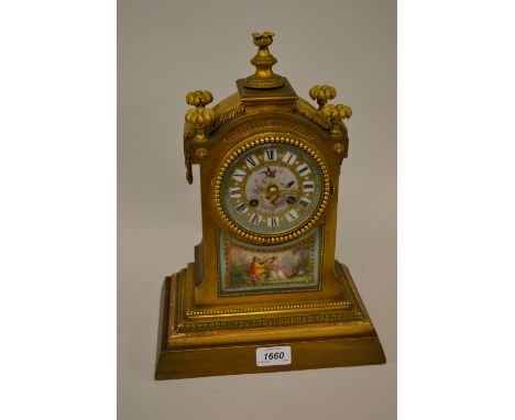 19th Century French ormolu and porcelain mantel clock, the panels painted with figures in a garden and birds in foliage, the 