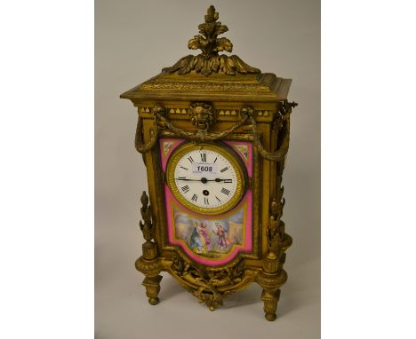 19th Century French gilded spelter and porcelain mounted mantel clock, the panels decorated with figures in landscapes having