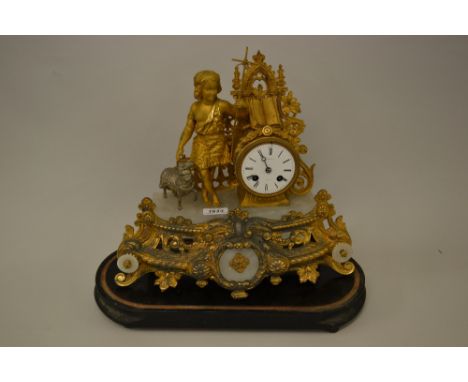 19th Century French gilded and silvered spelter mantel clock with alabaster mounts, the figural surmount in the form of a boy