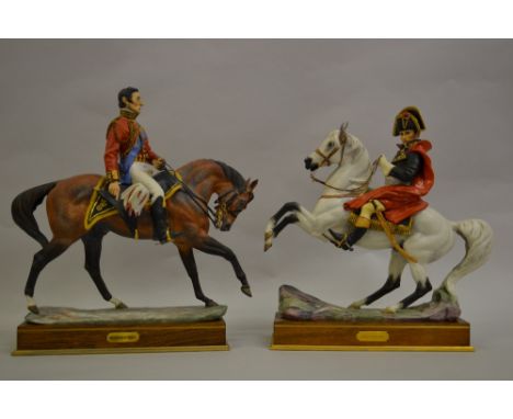 Pair of large Royal Worcester matt glazed figures of Wellington and Napoleon on horseback from the Famous Military Commanders