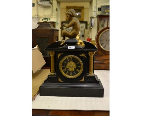 19th Century French black slate and gilded spelter mounted mantel clock, the architectural case with seated figure surmount, 