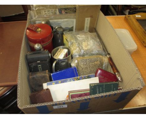 Box containing a quantity of miscellaneous items including: hip flasks, two cameras, playing cards, cased gilded and plated f