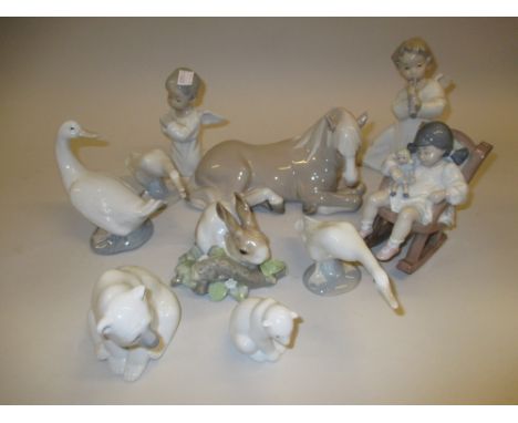 Ten various Lladro and Nao figures, children and animals (one a/f)