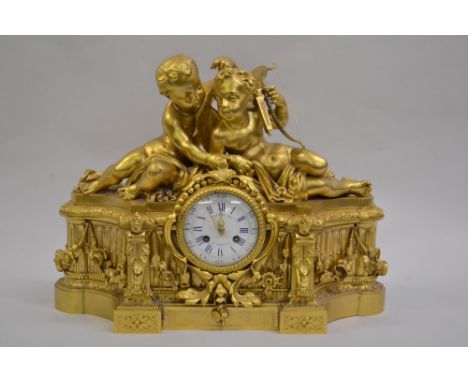 Fine quality 19th Century French ormolu mantel clock, the neo classical case surmounted by figures of Cupid, the enamel dial 