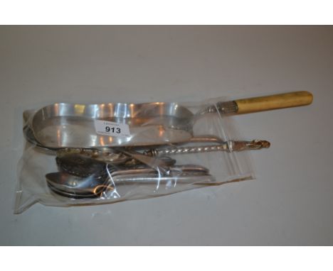 Silver plated crumb scoop with ivory handle, plated Apostle handled fruit spoon, plated caddy spoon in the form of a flower, 