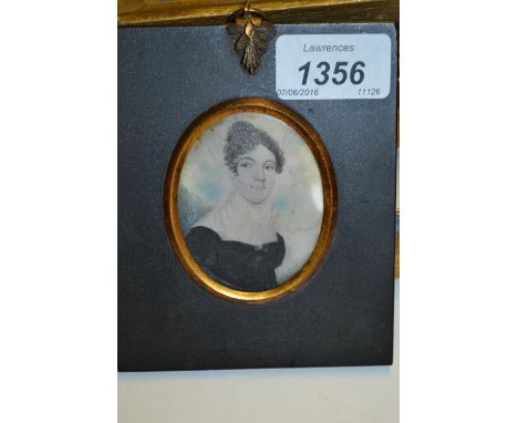 19th Century miniature portrait on ivory of a young lady in a black tunic, together with a miniature study of semi nude lady 