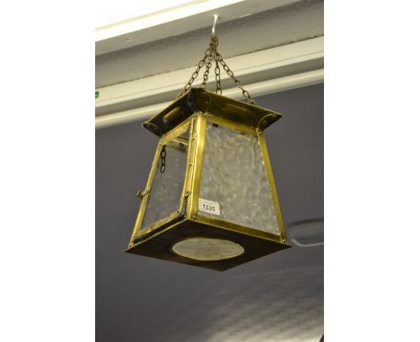 Arts and Crafts brass hall lantern together with a brass three branch light fitting