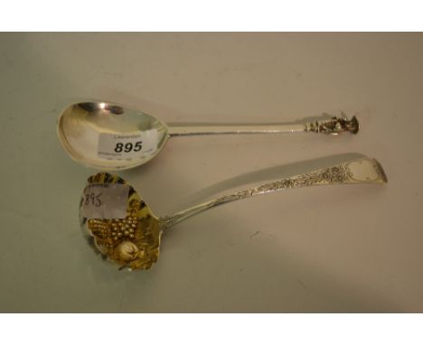 Georgian silver ladle with gilded fruit decorated later pierced bowl, together with a 20th Century London silver antique styl