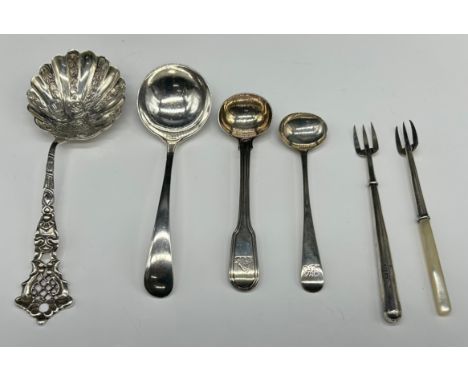 Mixed group of small silver flatwareA Danish small ladle, decorated handle and bowl; a plain cream ladle; two Georgian condim