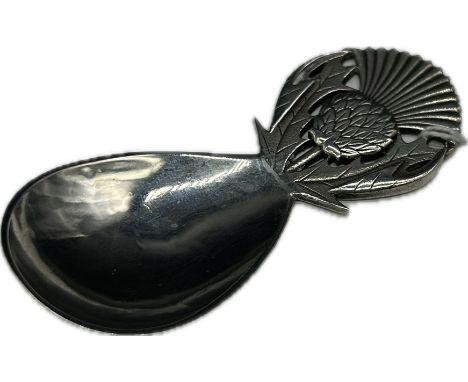 Scottish silver caddy spoonR, E Stone, Edinburgh 1931, planished fig shaped bowl, the handle as a thistle[L9.2cm] [Weight: 43