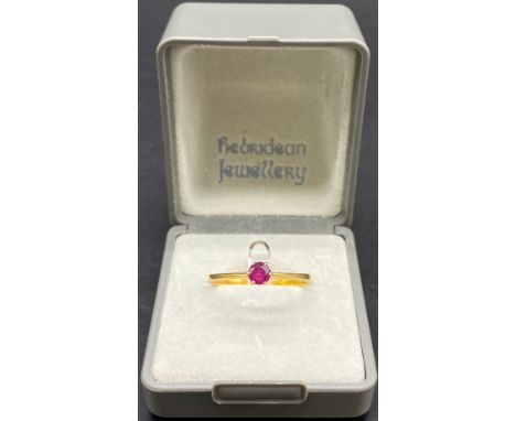 Small 9ct gold ring set with small central round cut ruby, in 18ct gold claw set mount and shank. Ring Size P/Q1.59g 