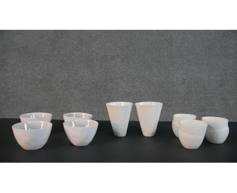 Four Lene Bjerre ceramic sake cups with grey glaze to the inside, three abstract design sake cups with dotted design and two 
