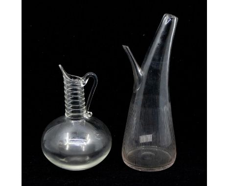 2 20th century decanters comprising one globe and shaft design with wrythen decoration to the neck, applied handle and a Scan