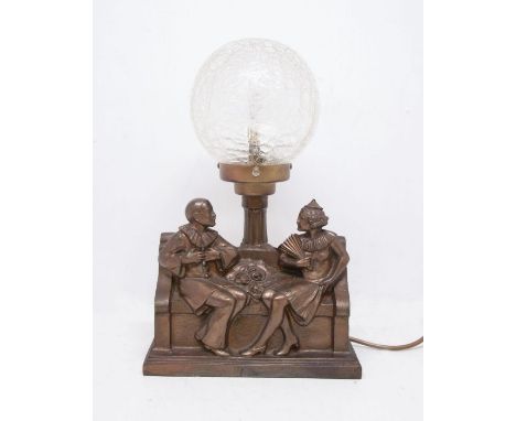 Spelter 1930s Pierrot clown and Columbine seated with roses between, crackle glass shade table lamp. Damage to back.