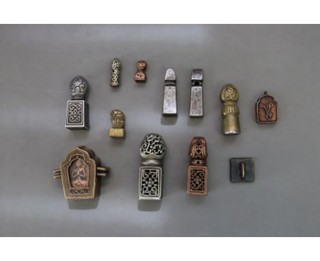 A Group of Sino Tibetan Seals, in Bronze or Silver, and Two small Gau, c.1900 and earlier