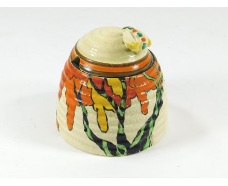 CLARICE CLIFF. A Clarice Cliff Honolulu pattern honey pot, printed Fantasque marks to base.  Please note that all items in th