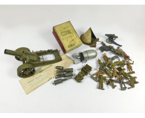 BRITAINS HOWITZER, BARRAGE BALLOON ETC. A Britains No 185 Barrage Balloon Unit & box, a Britains Howitzer with instruction & 