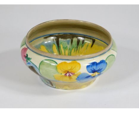 CLARICE CLIFF. A Clarice Cliff small bowl in the Pansies pattern. Hand painted naming & printed back stamp. max. diameter 12c