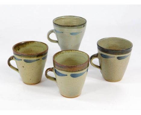 LEACH POTTERY. Four Leach Pottery Standard Ware handled beakers with painted decoration. Provenance: Purchased direct from th