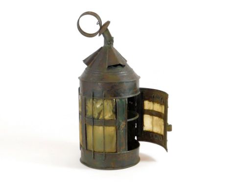 TIN LANTERN. An antique tin & horn lantern with three ventilators & a single door. Traces of old paint. (Horn panels slightly