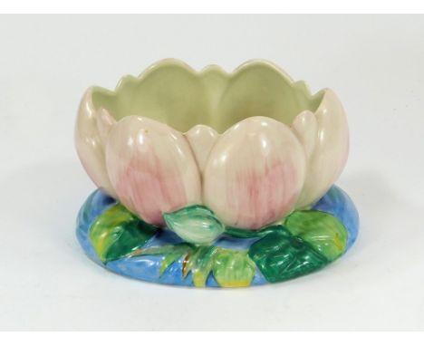 CLARICE CLIFF. A Clarice Cliff moulded Lily bowl. Base width 21.5cm.  Please note that all items in this auction are previous