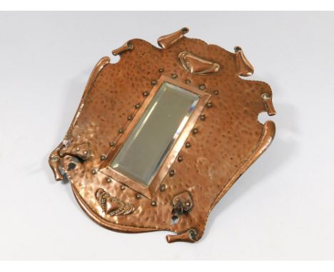 HAYLE COPPER. A J & F Pool, Hayle copper hall mirror with hooks for brushes. Height 36cm. Width 32cm.  Please note that all i