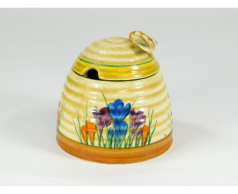 CLARICE CLIFF. A Clarice Cliff honey pot in the Autumn Crocus pattern. Printed marks to base.  Please note that all items in 