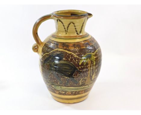 PHILIP LEACH. A Springfield Pottery slipware pitcher sgraffito decorated with elephants by Philip Leach. Signed & dated 2009.