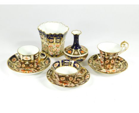 ROYAL CROWN DERBY. Three Royal Crown Derby cups & saucers of different shapes but all pattern 2451. Also, a cache pot in patt