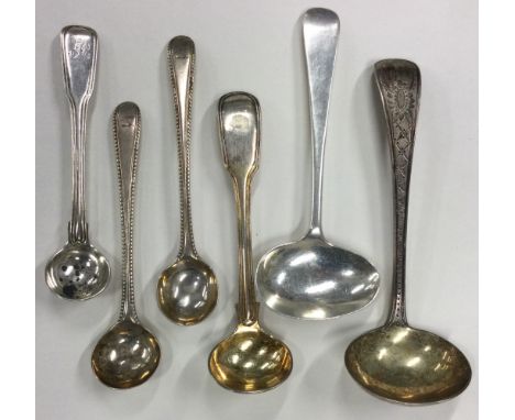 A heavy Exeter silver ladle together with salt spoons etc. Various dates and makers. Approx. 120 grams. Est. £30 - £50.
