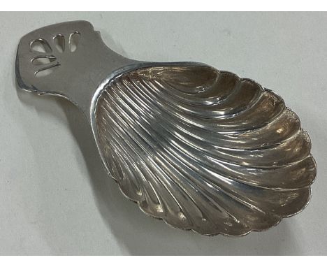 A fluted silver caddy spoon. Sheffield 1973. By Royal Irish Silver Company. Approx. 19 grams. Est. £20 - £30.