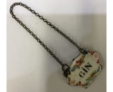 An 18th Century Bilston Enamel wine decanter label for 'Gin'. Circa 1780. Est. £30 - £40.