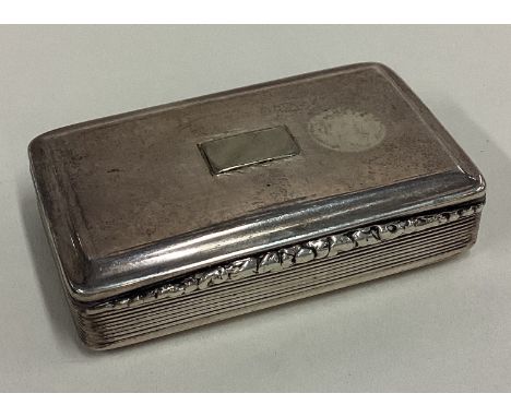 A William IV silver snuff box with hinged lid. Birmingham 1835. By Nathaniel Mills. Approx. 57 grams. Est. £100 - £150.