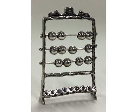 A rare Sterling silver abacus game. Approx. 16 grams. Est. £30 - £40.