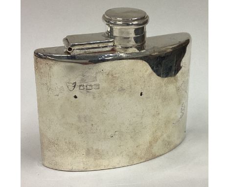 A good hinged top silver hip flask. Sheffield. By GJ. Approx. 84 grams. Est. £80 - £120.
