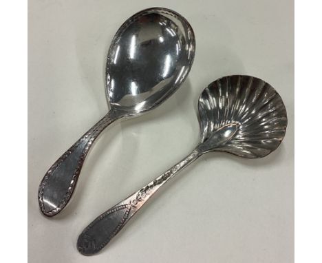Two Georgian silver plated caddy spoons. Circa 1800. Est. £15 - £20.