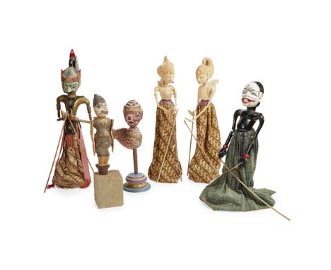 A GROUP OF JAVANESE WAYANG GOLEKS  19TH AND 20TH CENTURY  wood and fabric, comprising PUPPET, unpainted with string operated 