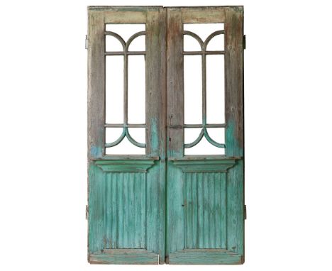 A PAIR OF OVERPAINTED WOODEN DOORS  LATE 19TH CENTURY   each with astragal-glazed panels above a linenfold panel and painted 