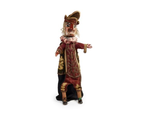 A RARE ENGLISH HAND PUPPET OF MR PUNCH  EARLY 19TH CENTURY   painted wood and fabric  90cm x 29cm x 10cm