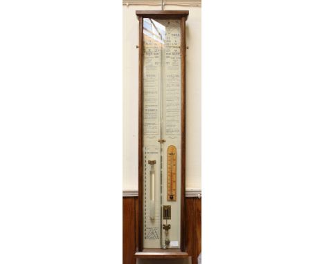 A large modern Admiral Fitzroy rise and fall barometer, with detailed card insert and thermometer, in a hardwood case.
