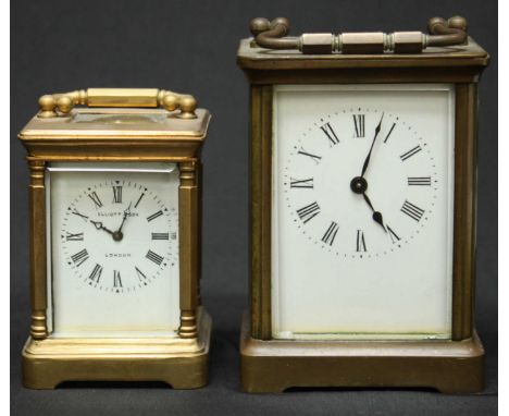 A small brass carriage clock by Elliott & Son of London, together with a larger carriage clock with white enamel. (2)