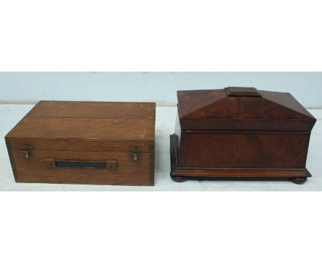 A Victorian flame mahogany tea caddy, together with an oak box. (2)