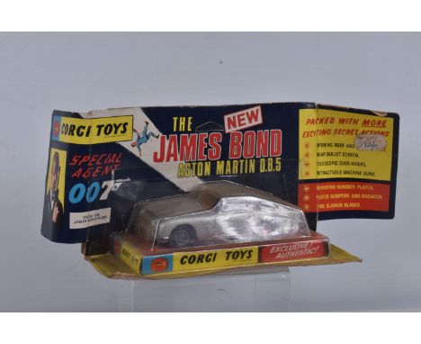 A BOXED CORGI TOYS JAMES BOND ASTON MARTIN D.B.5, No.270, appears complete with all working features, Bandit figure and suspe