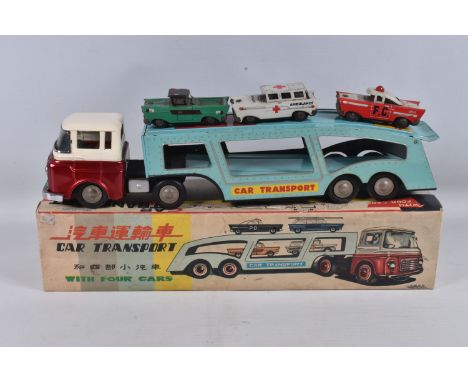 A BOXED CHINESE MADE FRICTION DRIVE TINPLATE ARTICULATED CAR CARRIER/TRANSPORTER, c.1960's, appears complete and in fairly go