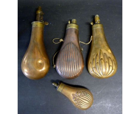 An Embossed Brass Powder Flask together with three other similar powder flasks