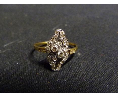 A 18ct. Gold Diamond Set Plaque Ring with Diamond Shoulders