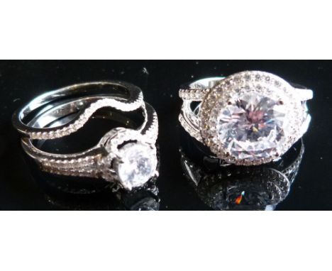 A 925 Silver Dress Ring, set with cubic zirconias, together with two other similar rings