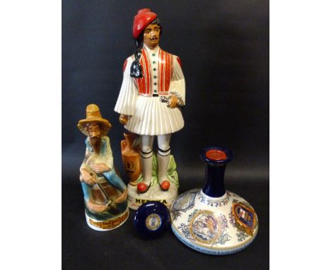 A British Navy Pussers Rum Decanter commemorating Lord Nelson, together with a Metaxa Decanter and another Old Cabin Still